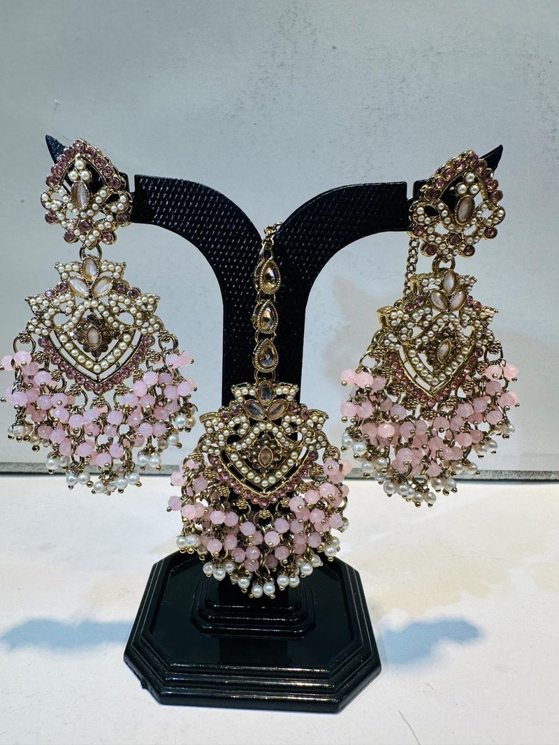 Pink antique gold chandbali earring and maang tikka set